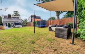 Beautiful home in Heinkenszand with Outdoor swimming pool, WiFi and 3 Bedrooms